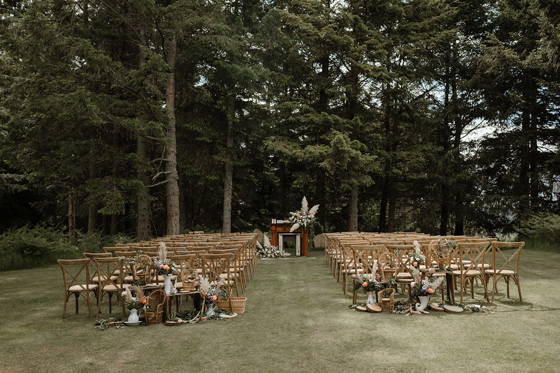 Outdoor ceremony set up with pampas grass on Cardney Estate